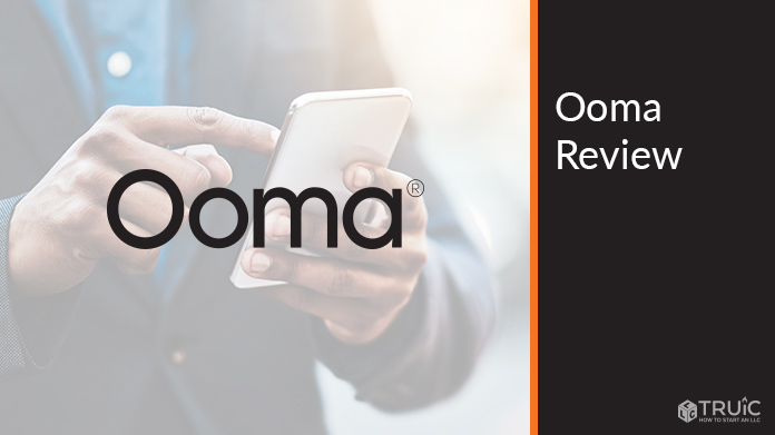 Ooma phone logo over blurred background.
