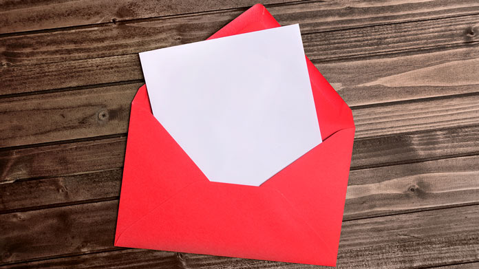 A piece of paper in a red envelope