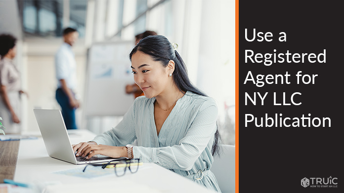Laptop user happy to find ways to save money on New York LLC publication.