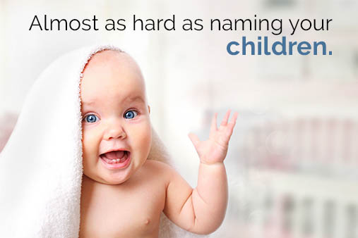 A baby under a towel with the text "Almost as hard as naming your children" above